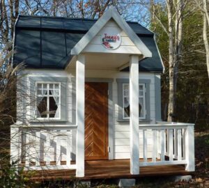 Discover Timeless Charm with the Grand Farmhouse 8x8 Wooden Playhouse